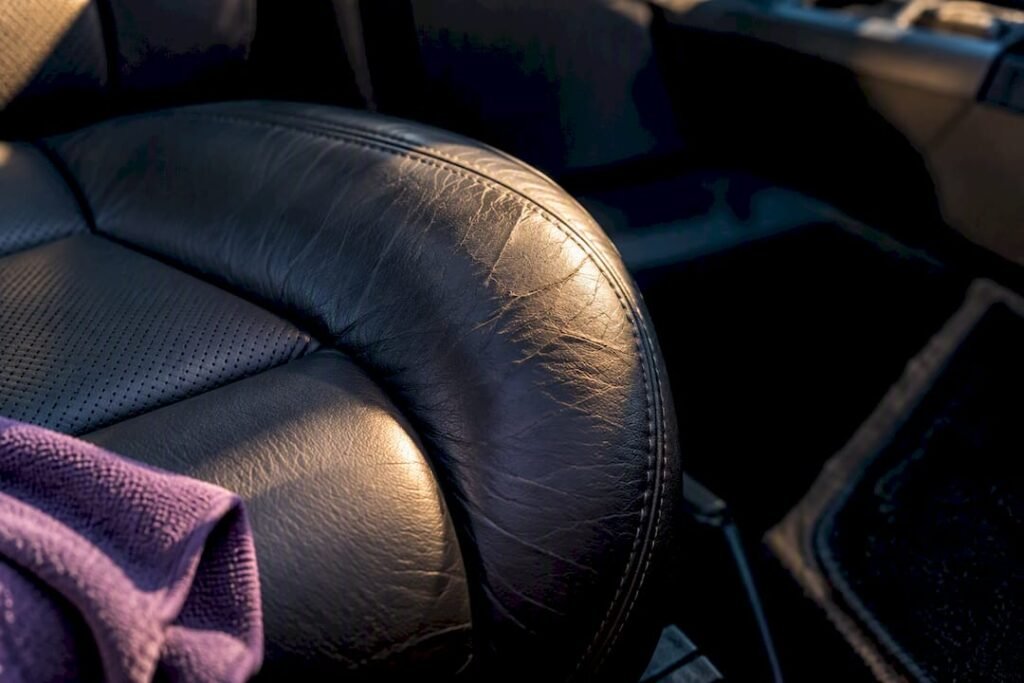 Early cracks on an anonymous leather seat bolster